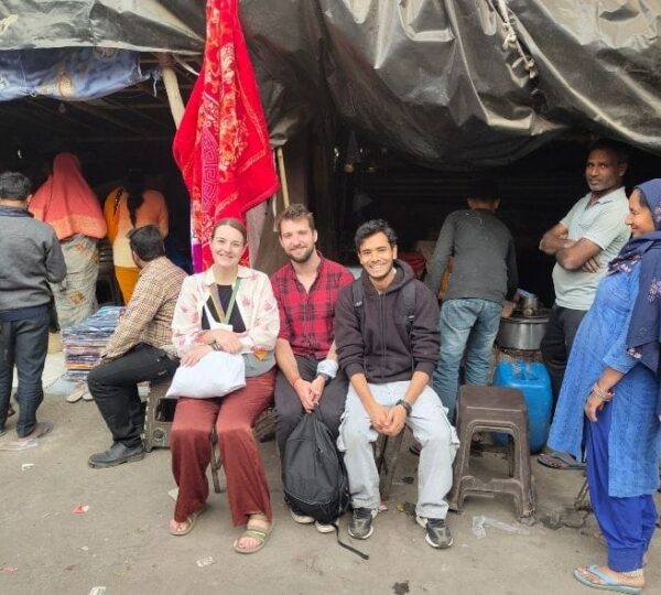 enjying cup of tea in sanjay colony slum
